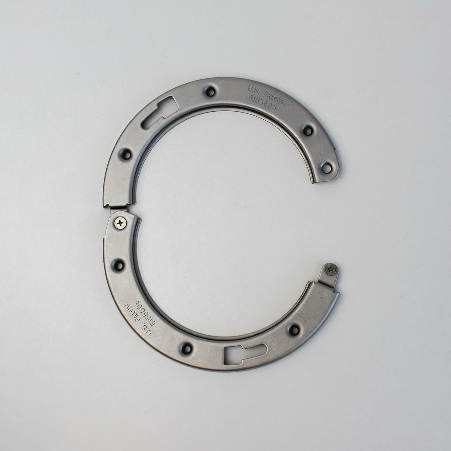 The Clam two-piece ring opened, showing the split design
